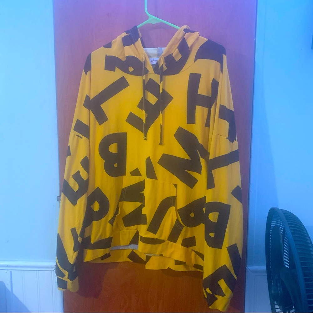 Yellow hoodie with letters